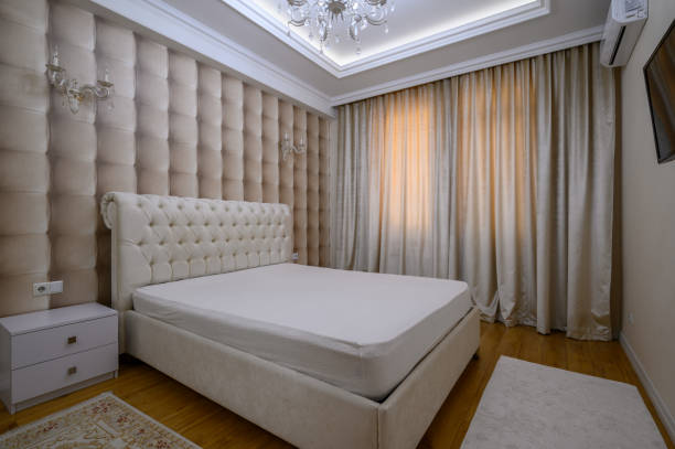 istock Luxury well designed modern beige master bedroom 1407295635