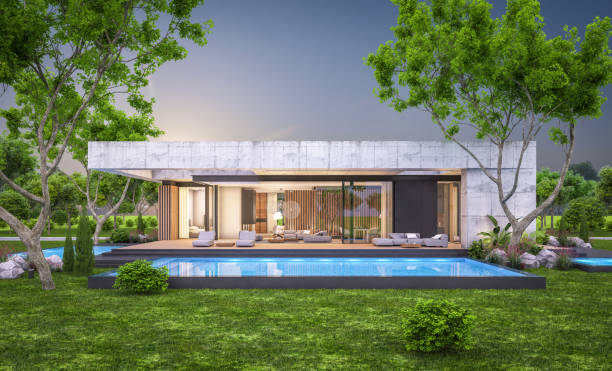 istock 3d rendering of new concrete house in modern style in evening 1407299412