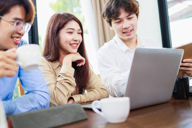 istock Teamwork business concept. Three Business people working at home office. home working business 1407299529