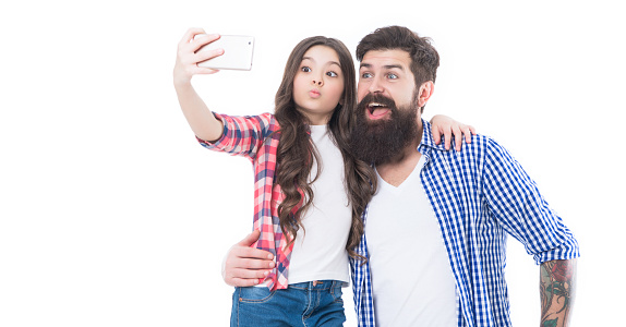 Happy family father and daughter take self-portrait with mobile camera phone isolated on white, selfie.
