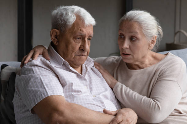 istock Loving wife gives support, express empathy to her older husband 1407303715