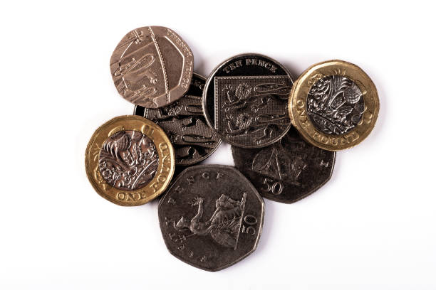 istock English coins of various denominations on a white background 1407303899