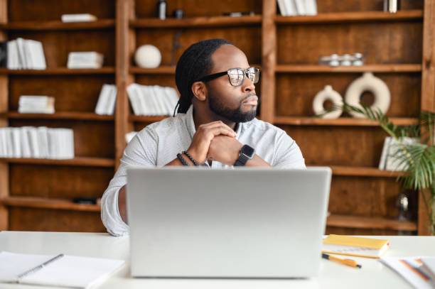 istock Serious thoughtful young African American man 1407309665