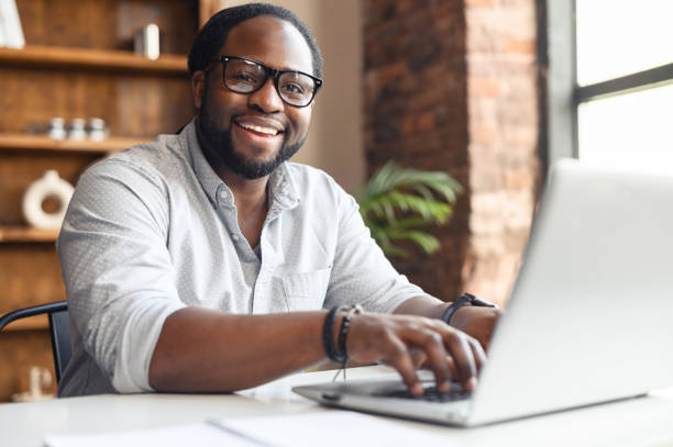 istock African American employee typing on a laptop 1407309669