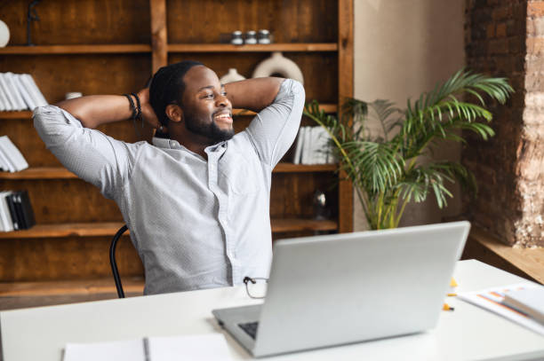 istock Successful African American businessman sitting 1407309700