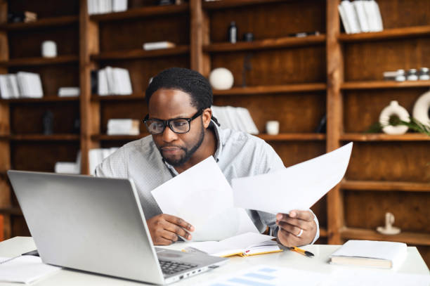 istock Modern technology concept with black ethnic man working in the cabinet 1407309707
