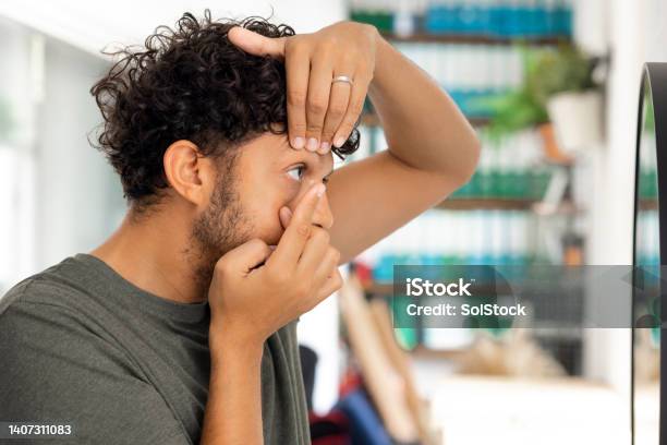 Contact Lens Application Stock Photo - Download Image Now - Contact Lens, Inserting, Lens - Optical Instrument