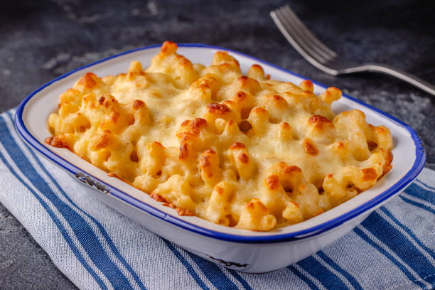 istock American mac and cheese, macaroni pasta in cheesy sauce 1407311171