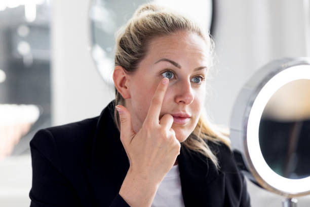 istock Concentrating Whilst Playing Contact Lens in Eye 1407311302