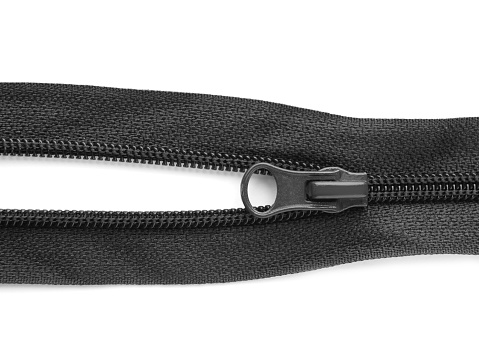 Black zipper on white background, top view