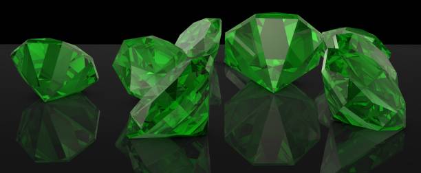 istock Green rubies on a glossy background with reflection. Gems. Background from stones. 1407313723