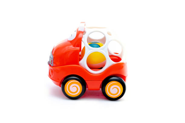 istock Colorful cute little mini red plastic car toy with teether for newborn babies isolated on white background mockup with copy space, toys for children,for boys, kids development, playing, childhood fun 1407314537