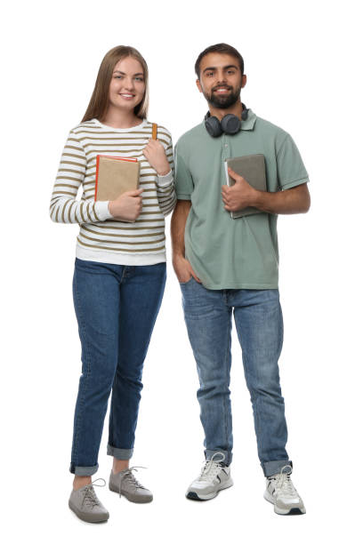 istock Happy students with books on white background 1407315813