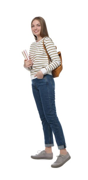 istock Teenage student with backpack and books on white background 1407316918