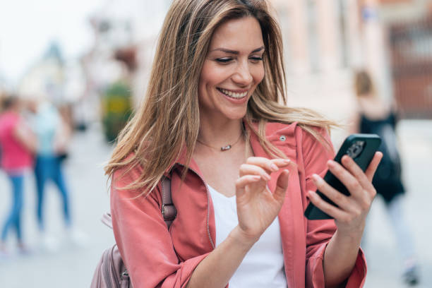 istock Woman with smartphone 1407318326