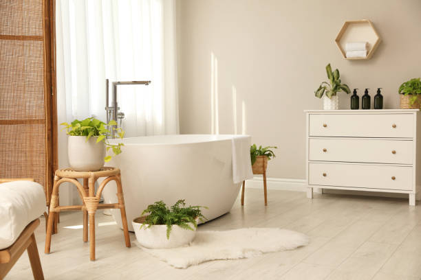 istock White tub near window in light room. Interior design 1407320411