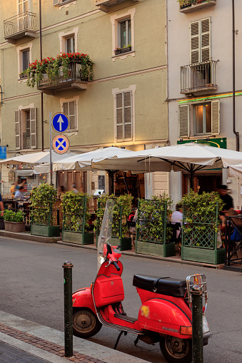 Italian street cafe and Vespa Motorcycle