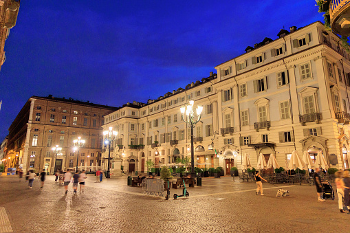 Turin, city square Piazza Carignano at dusk