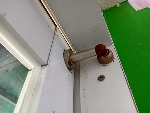 door stop magnet device attached to sliding door