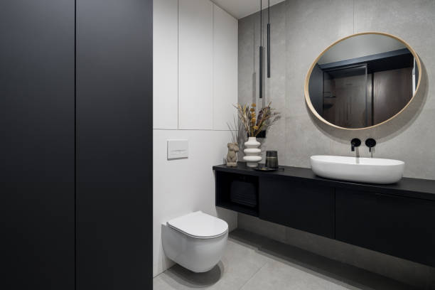 istock Spacious bathroom with gray tiles 1407326947