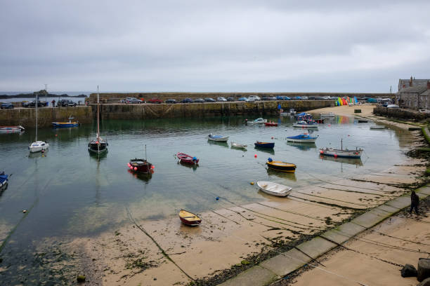 istock Boats are docked at the sea side 1407327136