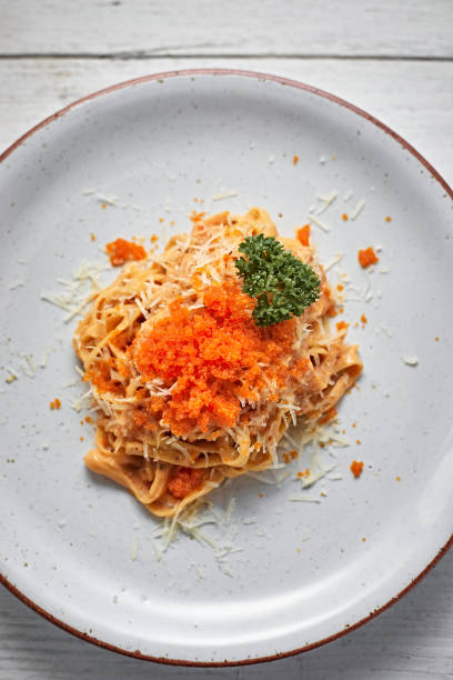 istock creamy sauce pasta with ebiko 1407332440