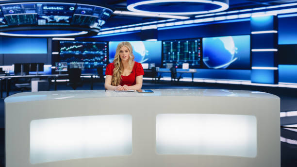 istock TV Live News Program with Professional Female Presenter Reporting. Television Cable Channel Anchorwoman Talks, Business, Economy, Entertainment. Mockup Network Broadcasting in Newsroom Studio Concept 1407332708