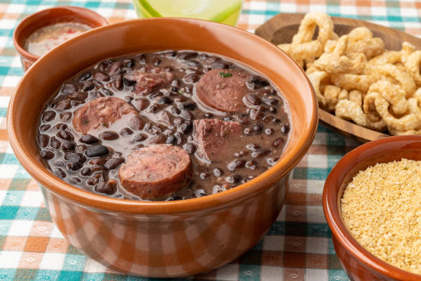 istock Typical brazilian feijoada with caipirinha, farofa and cracklings 1407333969