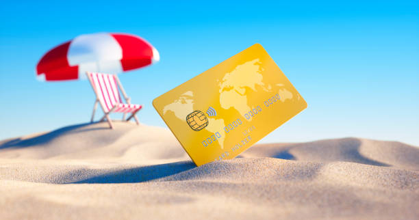 Credit card at beach stock photo