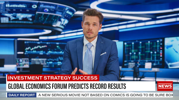 istock TV Live News Program: Charismatic White Male Presenter Reporting. Television Cable Channel Anchorman or Host Talking about Important Events. Network Broadcast Mock-up. Modern Newsroom Studio 1407334395
