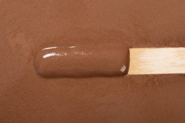 melted chocolate popsicle as background and texture stock photo