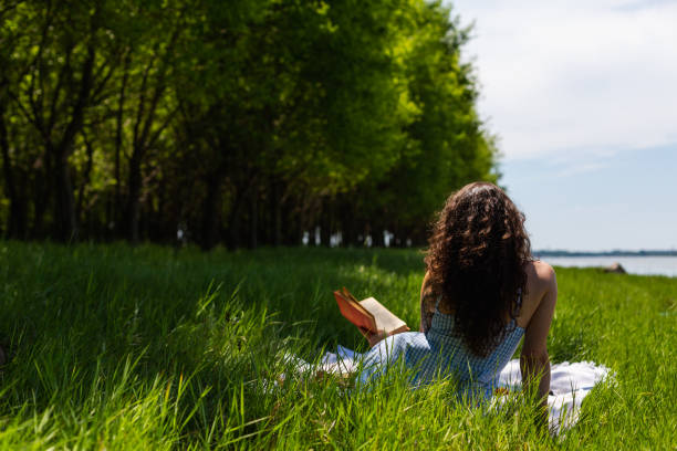 istock Women relaxing in nature 1407337005