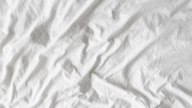 istock Abstract background of cloth, wave cloth wallpaper. 1407337250