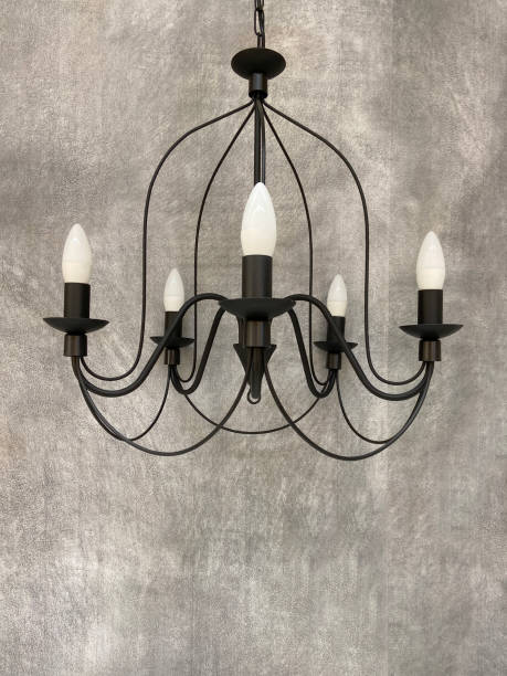istock Chandelier with concrete wall 1407340575