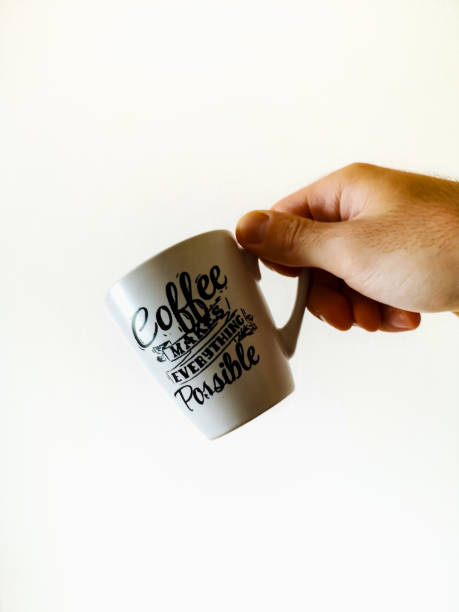 istock White cup with calligraphy lettering on it coffee makes everything possible holded in hand 1407343252