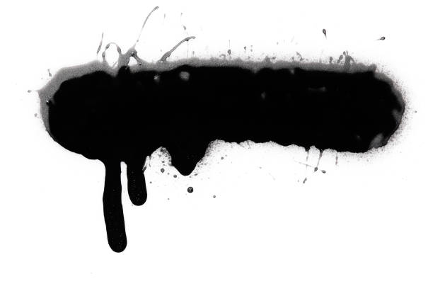 istock Black color spray paint or graffiti design element on the white wall background. 1407344483