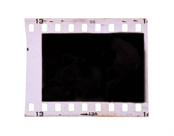 istock Old 35mm filmstrip or dia slide frame isolated on white background. 1407345155