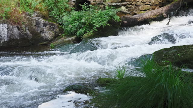 Slow motion water flow in the Anllons river, Refugio de Verdes, Galicia, Spain