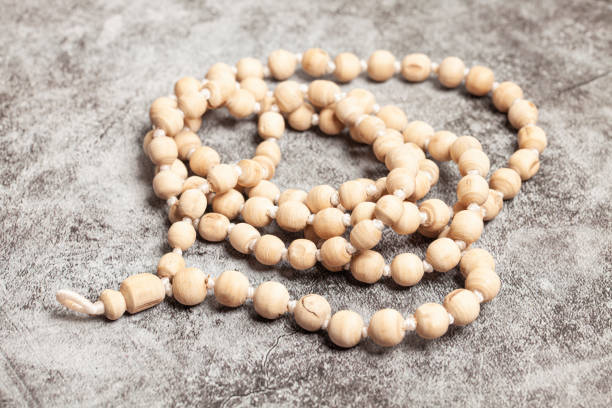 istock Rosary or prayer beads on a dark background 1407352741