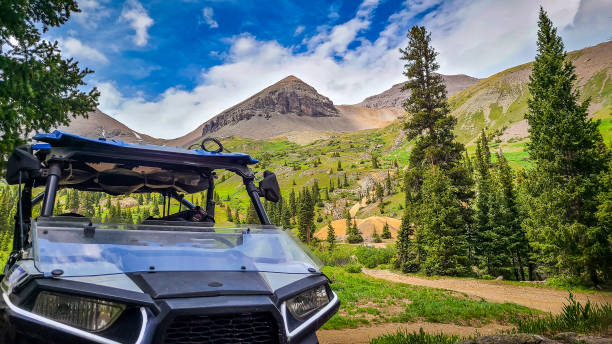 istock Side by side UTV ATV RZR with Mountain range in the background along the Yankee Boy Basin trail near Silverton and Ouray Colorado in the San Juan Mountains, Rocky Mountains Colorado. 1407352748