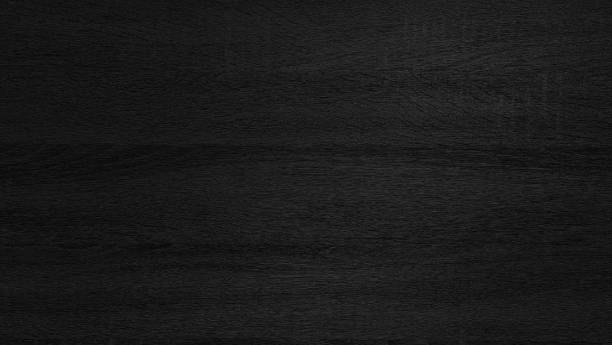 istock dark black melamine wood texture use as background. abstract rough wood material for interior finishing, furnishing works. wood texture with natural pattern for inner design and background. 1407354323