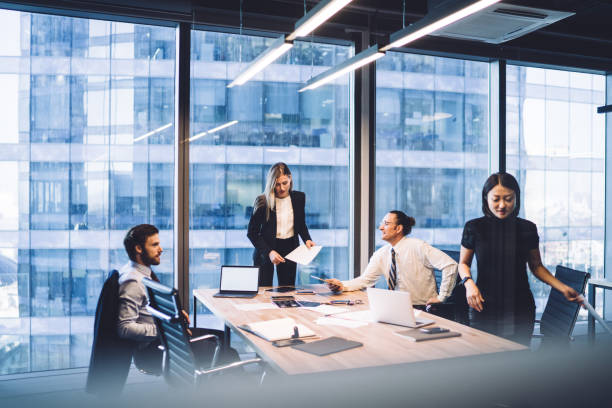 istock Multiethnic business people working together in office 1407354548