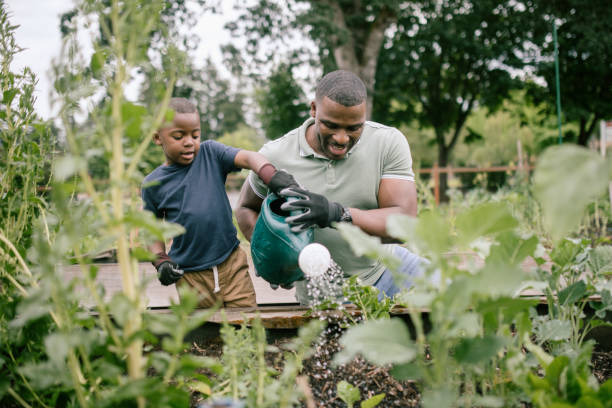 istock Father Gardening With His Son 1407356467
