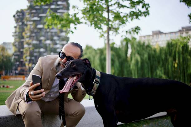 istock Mature man taking a selfie with his dog 1407358395