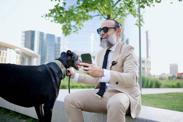 istock Mature man taking a selfie with his dog 1407358401