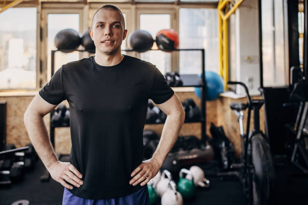 istock Fit man in gym 1407362817