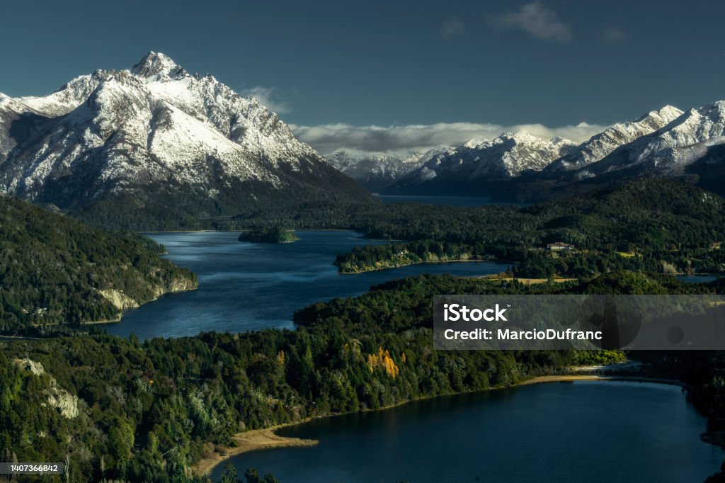 Argentina patagonia landscape Argentina patagonia landscape with snow capped mountains, lakes, trees and snow Argentina Stock Photo