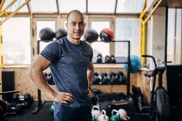 istock Fit man in gym 1407374234