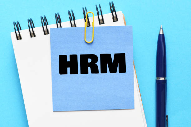 istock HRM Human Resource Management sign on notepad 1407375485