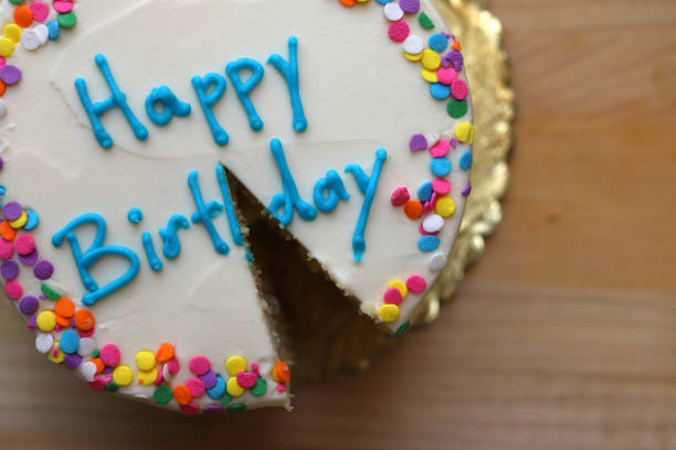 istock Top view of a birthday cake with sprinkles 1407376803